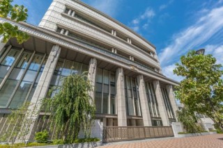 Headquarters of Japanese Nichiren Buddhist sect and non-governmental organization Soka Gakkai SGI. Hall of the Great Vow for Kosen-rufu in Shinanomachi, Tokyo. (Photo by Shutterstock)